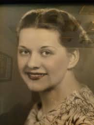 This is my great, great grandmother and my future aunt working in the  family grocery store in Chicago about 1917. Don't know the location.