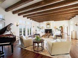Here the living room and dining room are side by side. How To Incorporate Ceiling Beams Into Your Style Soffitto Con Travi In Legno Soffitti Con Travi A Vista Travi Finte