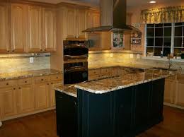 Medium Oak Cabinets With A Black Island Google Search Oak Kitchen Maple Kitchen Cabinets Oak Cabinets