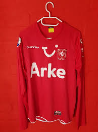 The official color combo is 'legend marine / light flash orange'. Fc Twente Home Football Shirt 2009 2010