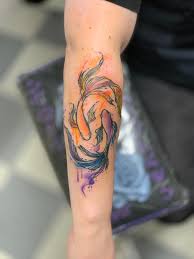 Some claim they cannot hold up as well as other tattoos over time, others that the term is far too often used by tattooists. Night Day Watercolor Koi Fish By Me At King S Ink In Acton Ma Tattoo