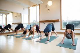 Yoga Class Downward Dog By Rob And Julia Campbell Large Yoga Stocksy United