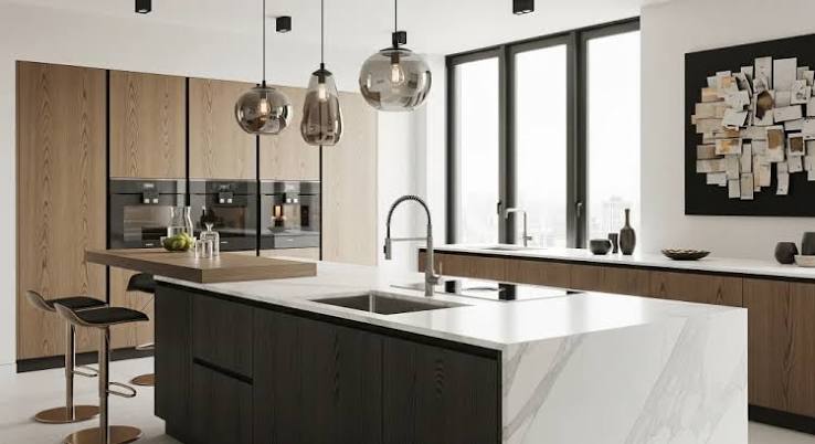 Large modern kitchen island with seating storage and quartz countertop