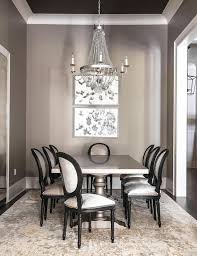 A table is a versatile feel free to let your table shine and stand out if you are to place it in the living room, dining room, or kitchen. Gray Dining Room With Gray Dining Table And Gold And Gray Rug Transitional Dining Room