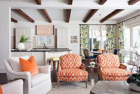 Retro look fabric upholstered wing chair and ottoman set ideal for your living room, den, home office, or professional work space. Orange Trellis Print French Chairs With Marble And Brass Accent Table Transitional Living Room
