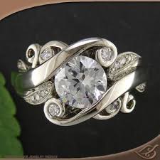 Design Your Own Unique Custom Engagement Ring And Unusual Wedding Bands In Gold And Platinum Custom With Images Swirly Engagement Rings Beautiful Rings Beautiful Jewelry