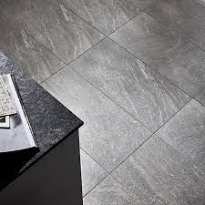 Hardwearing and easy to maintain, the two grey tones are suitable for use in any room and provide the perfect match of style and substance. Slate Light Grey Matt Flat Stone Effect Porcelain Wall Floor Tile Pack Of 6 L 590mm W 290mm Diy At B Q