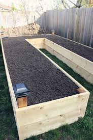 Diy Easy Access Raised Garden Bed The Owner Builder Network Building A Raised Garden Raised Garden Garden Beds