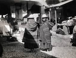 Rugged scenic beauty, colorful costumes, and ancient castles abound in tiny nation that once ruled a vast empire. In This Image From 1909 Two Women Chat At A Market In La Paz Bolivia Writer And Photographer Harriet Chalmers Adams Wrote In The Accompanying Story If La Paz Is A Peacock