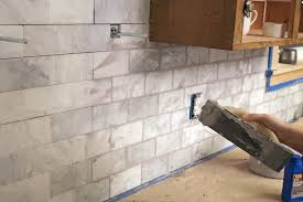 Marble dark after grouting : Diy Marble Subway Tile Backsplash Tips Tricks And What Not To Do The Craft Patch