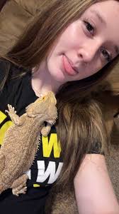 Lady with A Bearded Dragob and She Has A Beard