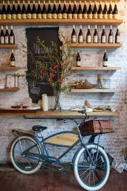 Velo Et Cave A Vin Le Charme Vintage De La Deco Opere Wine Shop Interior Italian Restaurant Decor Coffee Shop Decor