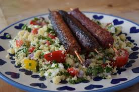 3/4 cup olive oil, 2/3 cup fresh lemon juice, 6 large garlic cloves, minced, 2 tablespoons chopped fresh mint, 4 teaspoons salt, 4 teaspoons grated lemon peel, 2 teaspoons ground black pepper, 2 teaspoons ground coriander, 1 teaspoon ground cumin. Enjoy Barbeque Season With This Lamb Kebab And Couscous Salad Recipe About Manchester