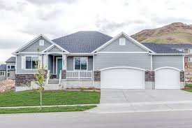 A Three Bay Split Garage Is A Car Enthusiast S Dream New Homes For Sale New Home Construction House Exterior