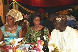 Bola tinubu and his first wife posing for the camera. Bola Tinubu Caught Red Handed By His Wife Picture Politics Nigeria