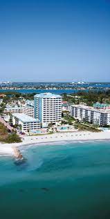 Lido Beach Resort In Sarasota Fl Is Surrounded By The Gulf Of Mexico And Sarasota Bay Lido Beach Resort Beach Resorts Lido Beach