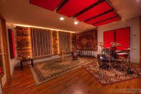 Check out our game room rug selection for the very best in unique or custom, handmade pieces from our rugs shops. Warmly Lit Large Open Space With Persian Style Rugs Like Home Studio Setup Music Studio Room Home Music Rooms