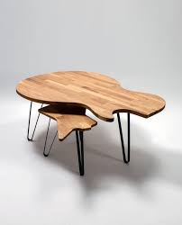 The character of the table's kidney shape complements well with a choice between bent pin me Ruwdesign Guitar Coffee Table Single Cut Model The Fellowship Of Acoustics