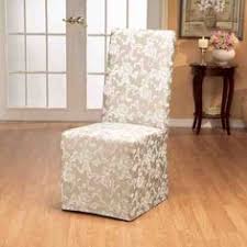 In a soft, floral pattern embossed knit the stretch slipcover stretches up to 40% to conform to your dining room chair. 13 Best Dining Room Chair Covers Ideas Dining Room Chair Covers Chair Covers Slipcovers For Chairs