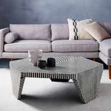 While choosing a coffee table may feel like both an overwhelming and an unsexy task, there are things to consider — beyond your overall aesthetic — to make the process a little less daunting. Black And White Bone Inlaid Faceted Coffee Table