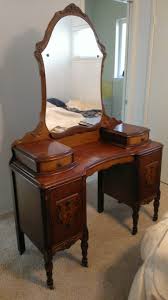 Antique bedroom vanity table with stool and mirror on a white background. Antique Vanity Table Mirror W Matching Stool Collectors Weekly