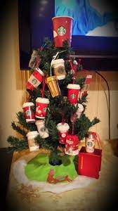 I added some sparkly wide ribbon and hung over it an over~sized ornament from target. My Starbucks Christmas Tree 2013 Starbucks Christmas Christmas Decorations Starbucks Crafts