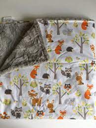 Blanket with adorable baby pachyderms in intarsia with sewn on ears. Woodland Forest Animal Baby Blanket Fox Baby By Dwelldarling Baby Blanket Animals Fox Baby Blanket New Baby Products