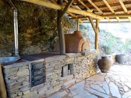 a wood burning masonry cookstove