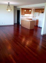 Beautiful Bamboo Flooring With A Cherry Stain Open Floor Plan Birch Cabinetry And Solid Surface Counter Cherry Wood Floors Flooring Bamboo Flooring