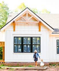 Blue shiplap house exterior with light and white sliding glass door. Home Build Update Paint Shiplap And Cabinetry Eva Shockey
