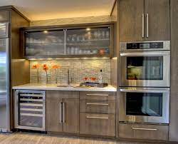 Are you wanting to stain them a darker colour? Popularity Of Gray Continues To Grow Dura Supreme Cabinetry Contemporary Kitchen Glass Kitchen Cabinets Stained Kitchen Cabinets