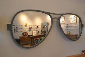 Choose your favorite mirrored sunglasses designs and purchase them as wall art, home decor. Madmen Style Knitted Eyewear For Cold Days Yelp Eyewear Store Design Mirror Decor Mirror Wall