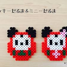 私の趣味 ミッキーだるまとミニーだるま お正月ガーランドにしたものです あか しろ くろ みどり さくら使用 アイロンビーズ パーラービーズ perlerbeads ミッキー ミニー ディズニー ミッキーだるま ミニーだるま オリジナル manualidades bordado hama