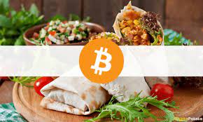 The restaurant chain will give away $100,000 worth of bitcoin thursday, as well as $100,000 worth of food. Ay5z4svi08lp5m