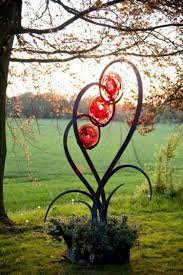 Top 15 Wonderful Glass Garden Ideas That Can Inspire You Metal Garden Art Garden Art Sculptures Yard Art