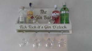 Originally, the recreational juniper berry water was derived from distilled wine instead of grain. Home Bar Drinks Alcohol Shelving Unit Gin Bar Glass Holder Ebay Gin Bar Bar Glass Holder Gin Shelf