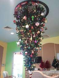 Christmas has always been a warm and wonderful time of year for people worldwide. Upside Down Tree Train Ok Weird Train Upside Down Christmas Tree Dollar Store Christmas Beautiful Christmas Trees