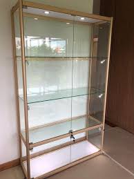 Mirrored curio cabinets create an illusion of a larger space with their reflection. Glass Display Cabinet Gold Series Furniture Home Living Furniture Shelves Cabinets Racks On Carousell