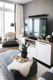 Small space moment is a place where you can find the smartest tips related to design, furnish and decorate apartments, condos, basements, bachelors and more. A Toronto Condo Packed With Stylish Small Space Solutions Condo Living Room Small Condo Living Small Living Rooms