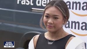 Olympic champion Suni Lee surprises students at her old high school