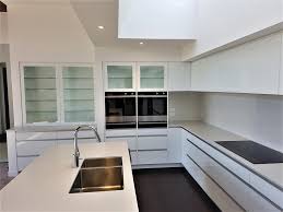 Our modern showroom includes three full kitchens, full of contemporary ideas. Modern Minimalist Kitchen Ron Kirk Joinery Ltd
