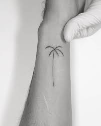 Palm Tree Tattoo On Erwan Heussaff S Wrist Palm Tattoos Palm Tree Tattoo Ankle Tree Tattoo Ankle