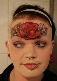 Image result for quirky pylon forehead tattoo