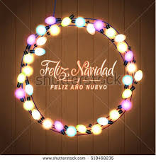 Merry Christmas And Happy New Year Spanish Language Glowing Christmas Lights Wreat Holiday Greeting Card Design Happy New Year Spanish Holiday Greeting Cards