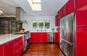 Red kitchen cabinets with white walls and countertops, complemented by black and stainless steel appliances and trim, will create a room that is warm and inviting, but relaxing as well. 27 Red Kitchen Ideas Cabinets Decor Pictures Designing Idea