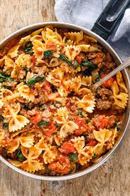 · heat up olive oil in a large pan. Tomato Spinach Sausage Pasta Recipe How To Cook Sausage Pasta Eatwell101