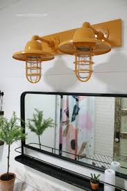 Its large backplate conveniently helps you cover up any holes or imperfections left behind after removing your old bath light. Barn Light Electric Farmhouse Bathroom Vanity Lights Lolly Jane