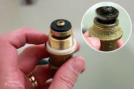 Traditional compression faucets usually drip from the spout when a stem washer becomes worn out, dry, and cracked. How To Repair A Leaky Shower Or Tub Faucet Pretty Handy Girl