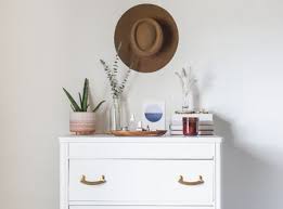 Bring farmhouse style into your bedroom with a metal bed frame featuring soft, rounded edges. 6 Steps For Decorating Your Dresser Top