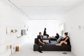 Did it say the white walls, wooden floors, and french windows were wide open? A Minimalist Monochromatic Apartment In Tel Aviv